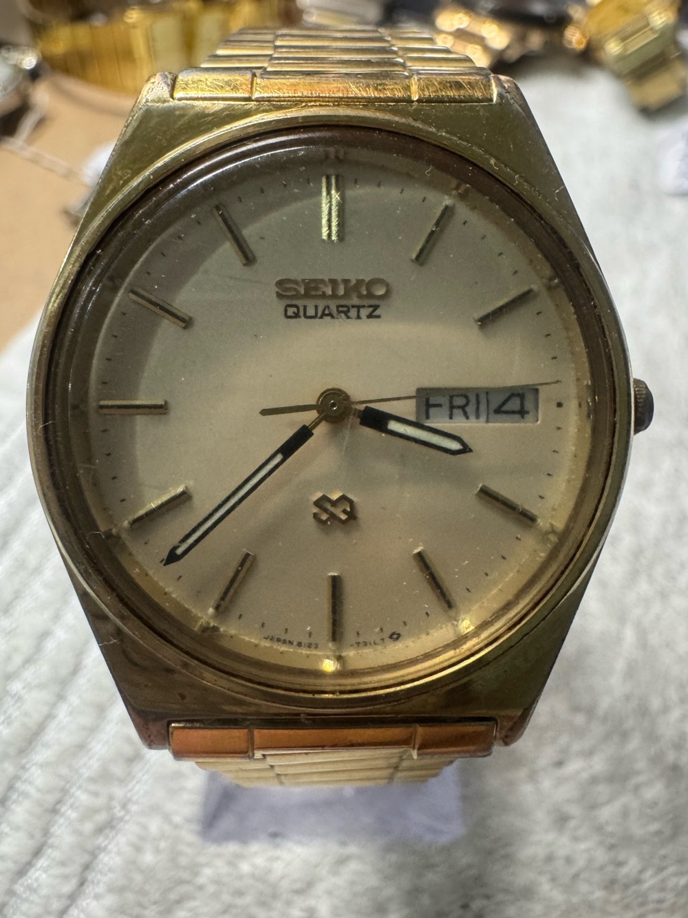 Seiko sq Gold Tone Men's Quartz Watch with Day-Date